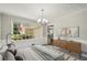 Bedroom with picture window and decorative furnishings at 2466 Country Club Dr, Conyers, GA 30013