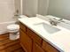 Bright bathroom with vanity, sink, large mirror, and shower at 3884 Grovemont Pl, Duluth, GA 30096