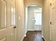 Hallway view of the entryway with an arched opening at 3884 Grovemont Pl, Duluth, GA 30096