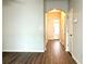 Open hallway with view to front door and neutral paint at 3884 Grovemont Pl, Duluth, GA 30096