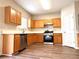 Spacious kitchen with stainless steel appliances and ample cabinet space at 3884 Grovemont Pl, Duluth, GA 30096