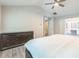 Spacious main bedroom featuring vaulted ceilings and neutral decor at 5077 Wellisford Ct, Suwanee, GA 30024