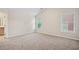 Bright and airy bedroom with plenty of natural light from the windows at 2040 Village Green Dr, Fairburn, GA 30213