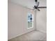 Bedroom featuring neutral walls, carpet, ceiling fan, and natural light from window at 4322 Braden Nw Ln, Kennesaw, GA 30144
