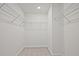 Spacious walk-in closet with ample shelving at 691 Sunstone Ln, Lawrenceville, GA 30043