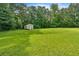 Large, well-kept backyard with a storage shed and plenty of room for outdoor activities at 700 Walkingstick Dr, Douglasville, GA 30134