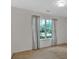 Bright bedroom featuring a large window and neutral decor at 700 Walkingstick Dr, Douglasville, GA 30134