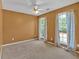 Bright bedroom features two large windows, plush carpeting, and neutral walls at 700 Walkingstick Dr, Douglasville, GA 30134