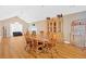 Spacious dining room with wooden table and chairs, complemented by natural light and a cozy atmosphere at 700 Walkingstick Dr, Douglasville, GA 30134