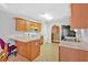 Bright kitchen featuring ample counter space, modern appliances, and a cozy eating area with island at 700 Walkingstick Dr, Douglasville, GA 30134