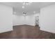 Large basement space with modern lighting and beautiful wood flooring, ready for customization at 173 Brush Creek Ct, Stockbridge, GA 30281