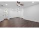Spacious basement with dark wood floors, ample lighting, and potential for various uses at 173 Brush Creek Ct, Stockbridge, GA 30281