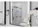 Sleek bathroom mirror with integrated lighting and modern fixtures in a stylish bathroom setting at 173 Brush Creek Ct, Stockbridge, GA 30281