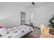Bedroom features hardwood floors, a ceiling fan, and large closet space at 173 Brush Creek Ct, Stockbridge, GA 30281