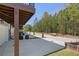 Townhome exterior with neat landscaping, garages, and a serene setting at 173 Brush Creek Ct, Stockbridge, GA 30281