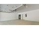 Spacious garage with ample storage space and high ceilings, ready for vehicles and projects at 173 Brush Creek Ct, Stockbridge, GA 30281