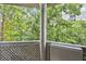Cozy balcony with views of lush greenery, providing a serene outdoor space at 244 13Th Ne St # 302, Atlanta, GA 30309