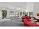 Spacious room with large windows, offering ample natural light and a welcoming atmosphere at 244 13Th Ne St # 302, Atlanta, GA 30309