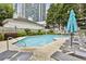 Inviting pool area with lounge chairs, perfect for relaxation and recreation at 244 13Th Ne St # 302, Atlanta, GA 30309