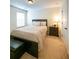 Bedroom with a bed, a nightstand, and a window with blinds at 5715 Radford Loop # 15, Fairburn, GA 30213