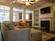 Comfortable living room with coffered ceiling, fireplace, and an open floor plan at 5715 Radford Loop # 15, Fairburn, GA 30213