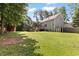 Spacious backyard with a shed and partial fence at 98 Little John Way, Douglasville, GA 30134