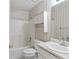 This bathroom features a vanity, bath tub with shower, and toilet at 98 Little John Way, Douglasville, GA 30134