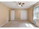 Large bedroom featuring closet space, natural light and neutral paint at 98 Little John Way, Douglasville, GA 30134