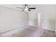 Spacious bedroom featuring a ceiling fan and an ensuite bathroom at 98 Little John Way, Douglasville, GA 30134