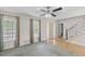 Bright living room with large windows and a view of the front yard at 98 Little John Way, Douglasville, GA 30134