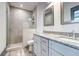 A bathroom featuring double sinks and a walk-in shower at 1497 Rogers Ave, Atlanta, GA 30310