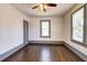 Bedroom with hardwood floors and natural light from a window at 1497 Rogers Ave, Atlanta, GA 30310