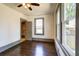 A vacant bedroom with hardwood flooring, and a closet at 1497 Rogers Ave, Atlanta, GA 30310