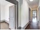 Hallway with hardwood floors and grey trim at 1497 Rogers Ave, Atlanta, GA 30310