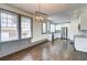 Spacious kitchen featuring white cabinets, stainless steel appliances and bright natural lighting at 1497 Rogers Ave, Atlanta, GA 30310