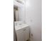 Bathroom features a vanity with modern sink, white cabinets, and chrome fixtures at 3500 Parkwood Hills Ct, Snellville, GA 30078