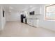 A kitchen featuring white cabinets, stainless steel appliances, and tile floors at 3500 Parkwood Hills Ct, Snellville, GA 30078