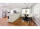 Open kitchen featuring modern appliances, granite countertops, and a connected breakfast nook at 3500 Parkwood Hills Ct, Snellville, GA 30078