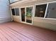 This back deck features ample room for entertaining, a freshly stained deck and outdoor access at 40 Dunwoody Springs Dr, Atlanta, GA 30328