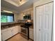 Kitchen featuring stainless steel appliances, granite countertops, and neutral cabinets at 40 Dunwoody Springs Dr, Atlanta, GA 30328