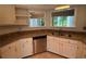 Bright kitchen with stainless steel dishwasher, double sink, and granite countertops at 40 Dunwoody Springs Dr, Atlanta, GA 30328