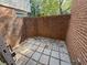 Enclosed brick patio area with stone paver flooring at 40 Dunwoody Springs Dr, Atlanta, GA 30328