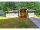 Well-maintained house featuring a lovely porch and a fenced yard, offering both comfort and security at 6494 Bimini Dr, Forest Park, GA 30297