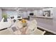 Bright open concept with hardwood floors, white walls, and natural light at 6494 Bimini Dr, Forest Park, GA 30297