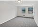Cozy bedroom featuring soft carpeting and bright windows at 8332 Mountain Pass, Riverdale, GA 30274