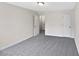 Empty bedroom features neutral carpet and white paint at 8332 Mountain Pass, Riverdale, GA 30274