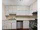 Kitchen with white cabinetry, stainless steel appliances, and tile backsplash at 8332 Mountain Pass, Riverdale, GA 30274