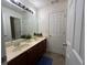Spacious bathroom with double sinks, vanity, and neutral decor at 1055 Havenstone Walk, Lawrenceville, GA 30045