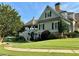 Clubhouse exterior features stone accents, beautiful landscaping and well-manicured lawn at 1055 Havenstone Walk, Lawrenceville, GA 30045