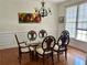 A formal dining room with traditional furnishings at 1055 Havenstone Walk, Lawrenceville, GA 30045